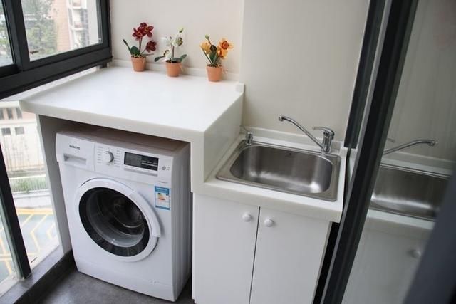 洗衣机上下排水的区别_洗衣机洗衣槽上下一体_洗衣机上排水图片