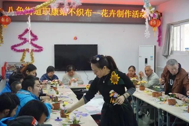 和谐八角图纸举办残疾人花卉出处活动制作wow工程300-1手工残联图片