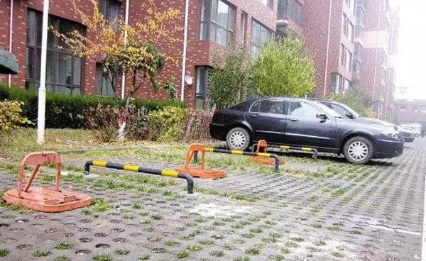 最高院判例:小区地面停车位归业主共有,开发商