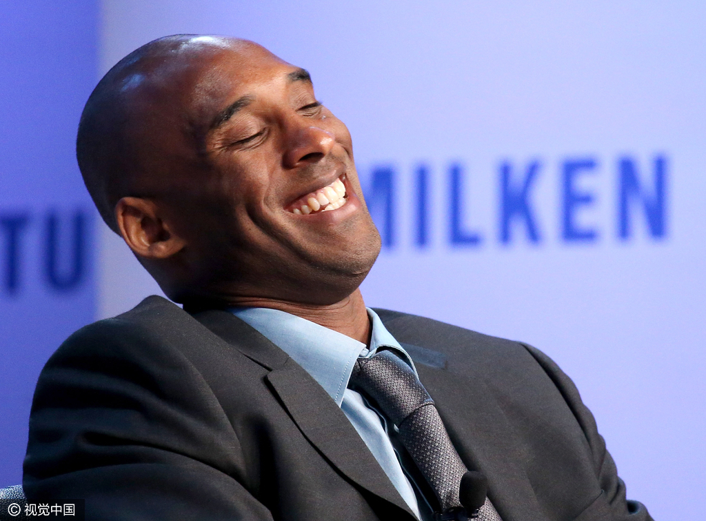 组图-总裁科比退役忙生意 出席会议表情搞怪风趣