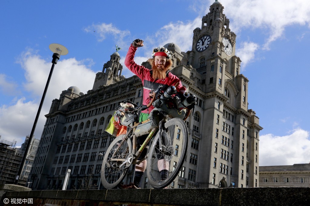 组图-真实"阿甘"铁人三项完赛 84天6700公里