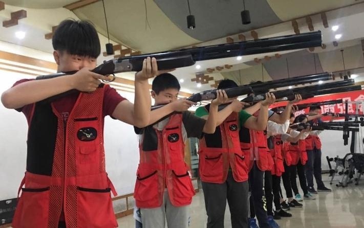 怎么做射击运动员 t0135649b8a94433676.jpg?size=711x446