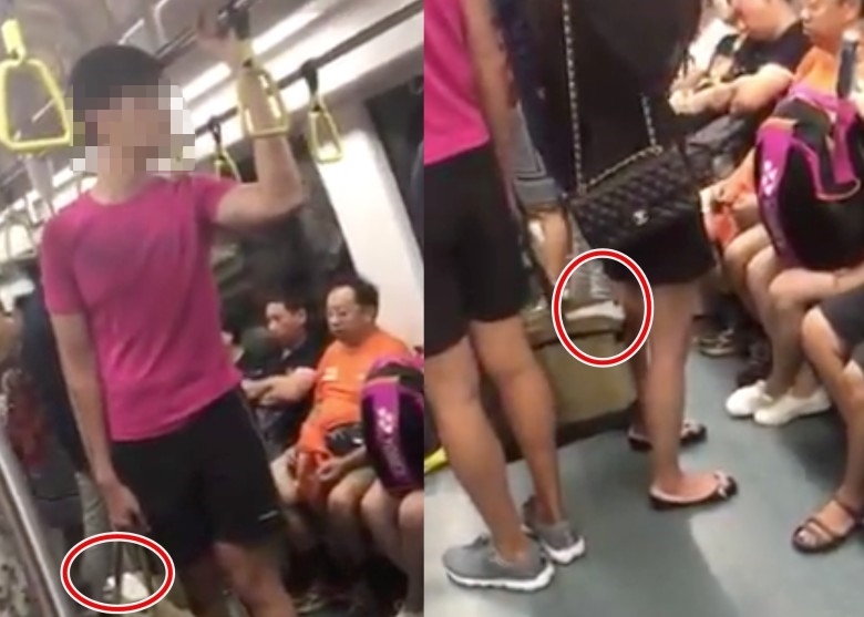 男子在地铁偷拍女性裙底