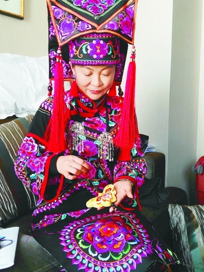 民族刺绣让人们记住乡愁 民族刺绣让人们记住乡愁