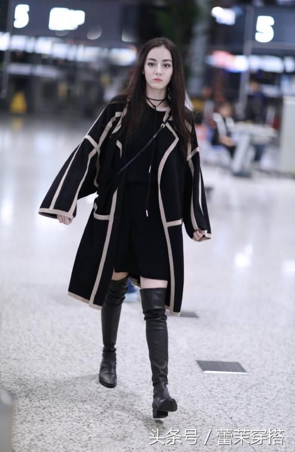 迪丽热巴现身机场!13万大衣惹争议,网友:送给我