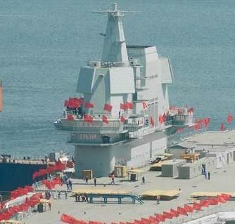 我国的第一艘国产航母与已经服役的辽宁舰有什