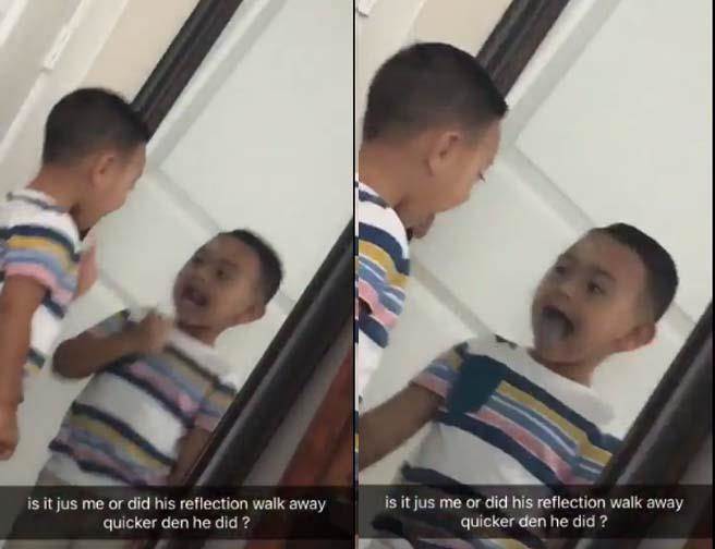 男童俏皮照镜子，镜中倒影早半秒离开，网友惊：那是谁？