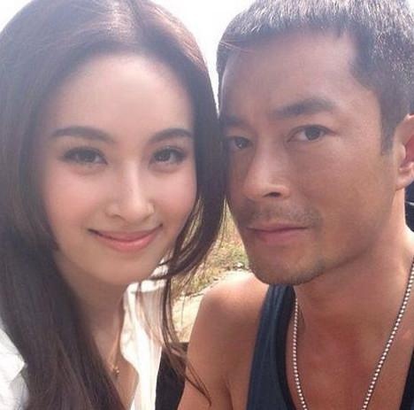 影帝张家辉搂"女神"出席活动,网友:知道她真实身份,还真不敢搂!