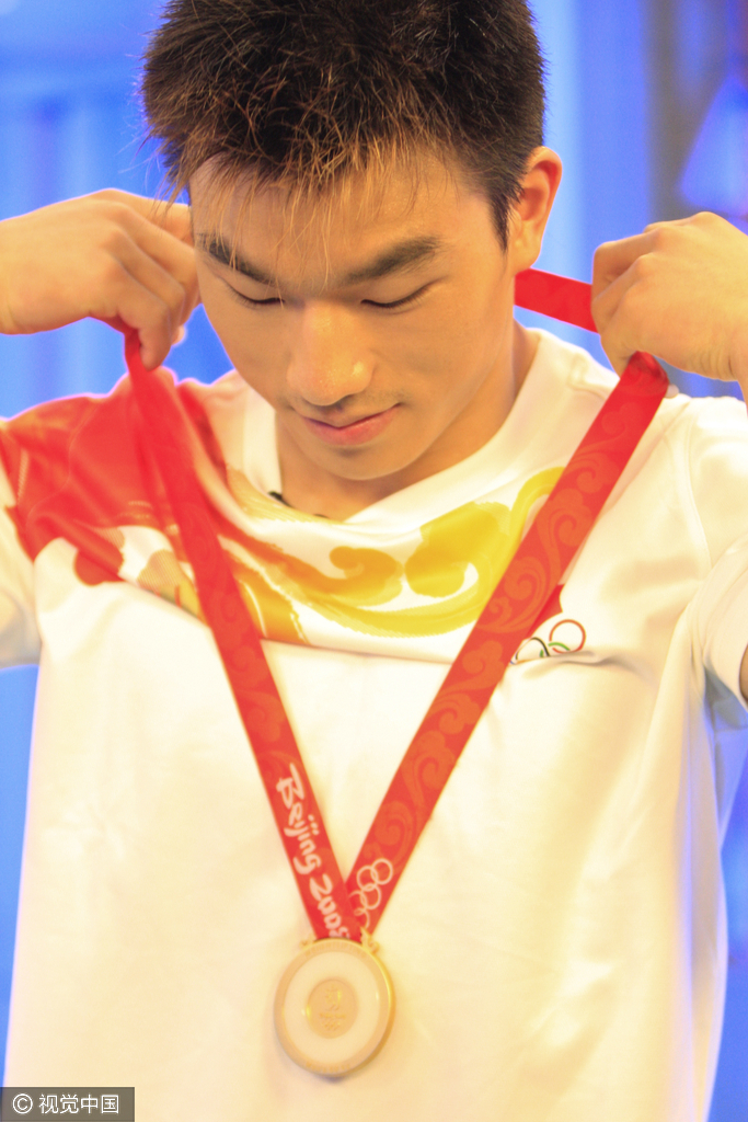 组图-举重名将廖辉宣布正式退役:无怨无悔