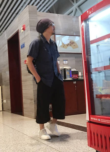 张锦程。