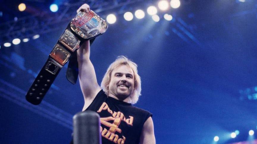 wwe史上最长最短的比赛,罗曼能血战一小时,有人竟2.5秒就缴械!