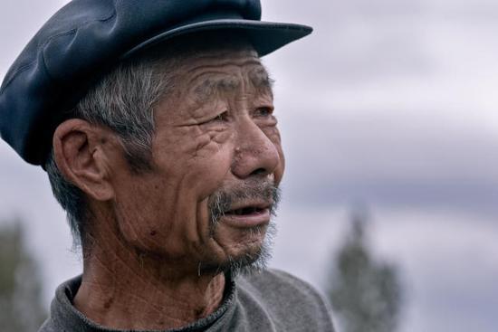 "滞销大爷"原图摄影师:摄于7年前 家中无滞销情况