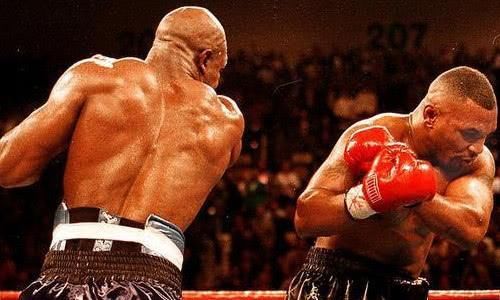 拳王泰森为何打不过霍利菲尔德?每天只想着花